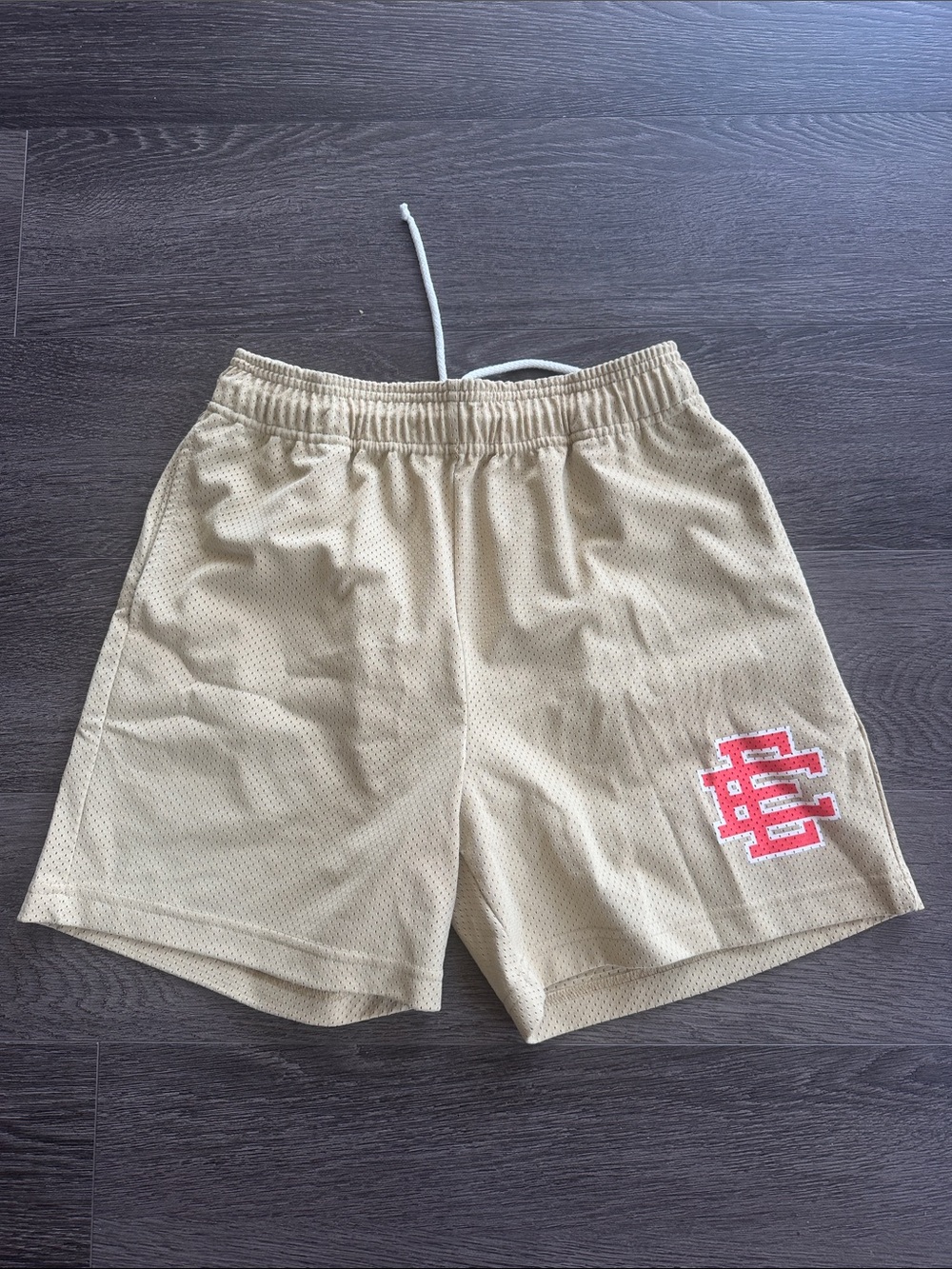 Eric Emanuel Tan Mesh Athletic Shorts with Red Logo Patch